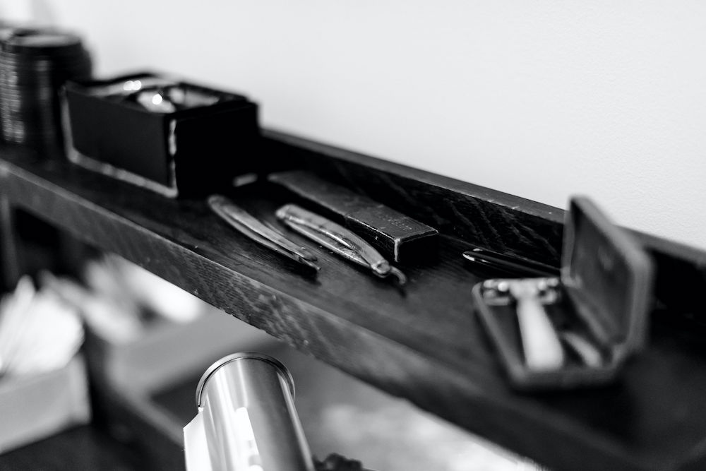 Close up of barber's tools in black and white